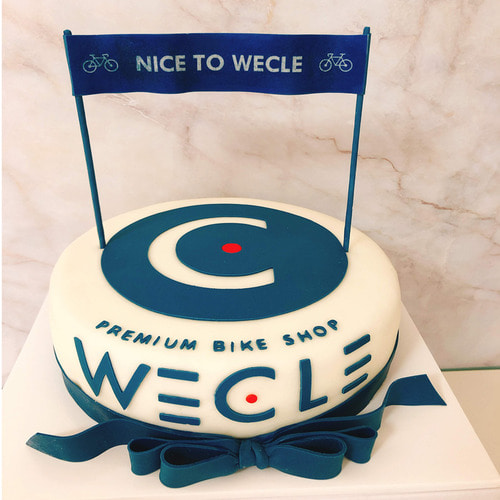 WECLE LOGO cake